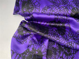 Fastvævet polyester - satin i lilla med sort mønster