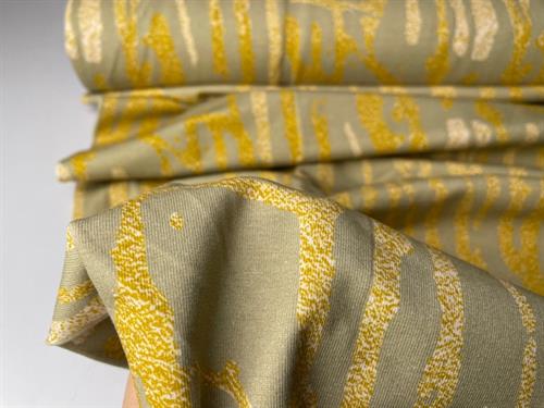 Bomuldsjersey - fancy print i guld